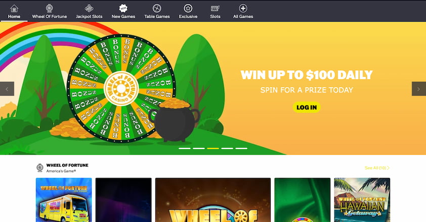 Wheel of Fortune Casino desktop homepage with the menu at the top and a big win up to $100 daily promo banner with feature games underneath it