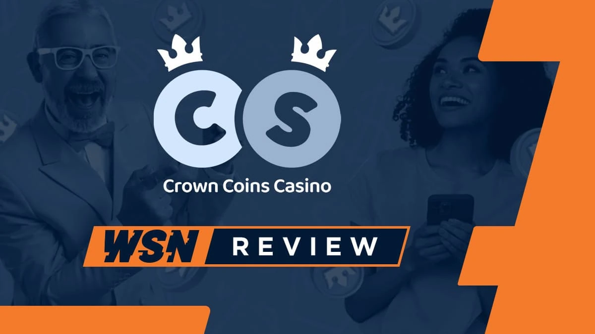 Crown Coins Casino logo with twin crowns above a WSN review ribbon, flanked by two players on a navy and orange banner