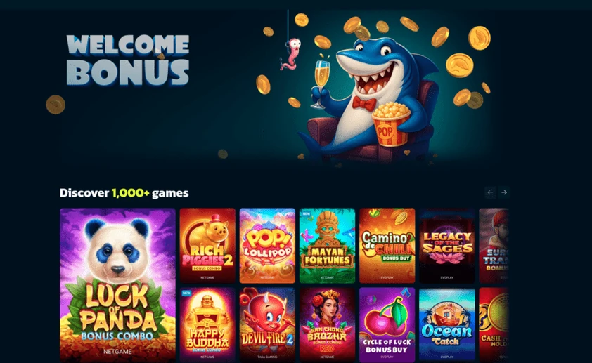 SweepShark homepage with a welcome bonus hero featuring a shark mascot with popcorn above a discover games slot carousel